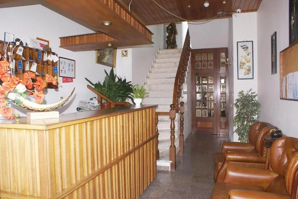 Traditional wooden reception at Hotel Primavera